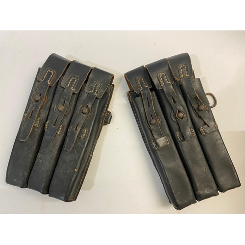 488 - TWO BLACK LEATHER GERMAN MAGAZINE POUCHES. Two German Second World War black leather Ammunition Pouc... 