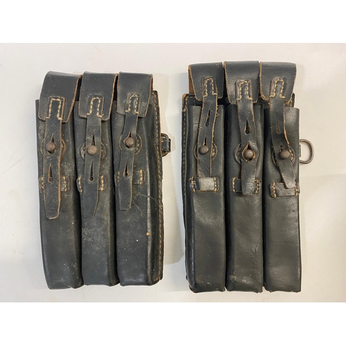 488 - TWO BLACK LEATHER GERMAN MAGAZINE POUCHES. Two German Second World War black leather Ammunition Pouc... 