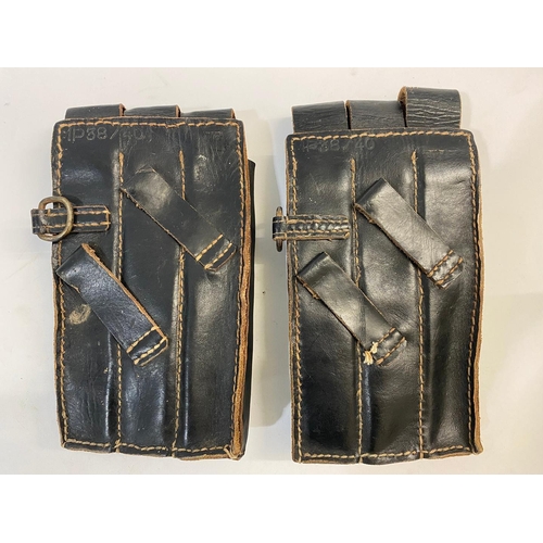 488 - TWO BLACK LEATHER GERMAN MAGAZINE POUCHES. Two German Second World War black leather Ammunition Pouc... 