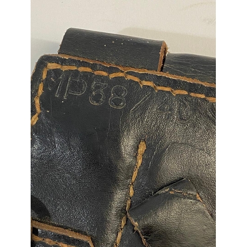 488 - TWO BLACK LEATHER GERMAN MAGAZINE POUCHES. Two German Second World War black leather Ammunition Pouc... 