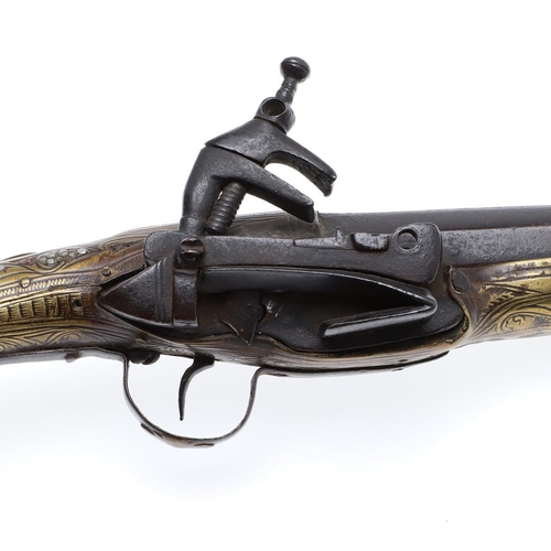 5 - A HIGHLY DECORATED 19TH CENTURY TURKISH FLINTLOCK PISTOL. With a 24.5cm barrel tapering from octagon... 