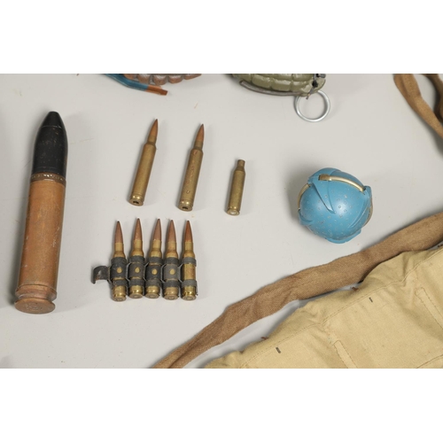 505 - A COLLECTION OF SHELL CASES, DUMMY ROUNDS AND A REPRODUCTION GRENADE. A 1947 3-IN-50 CAL Mk 7 shell ... 