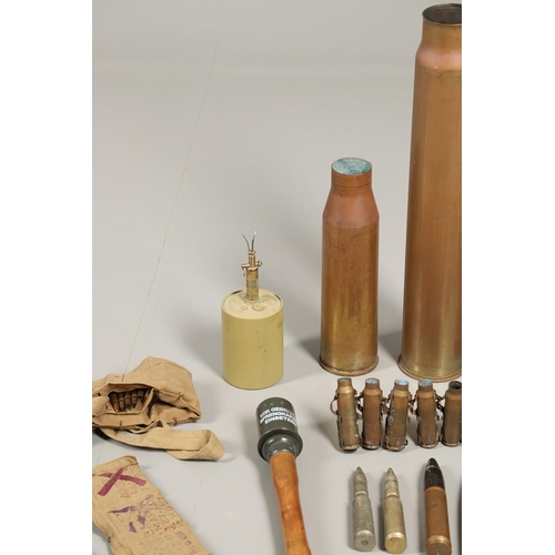 505 - A COLLECTION OF SHELL CASES, DUMMY ROUNDS AND A REPRODUCTION GRENADE. A 1947 3-IN-50 CAL Mk 7 shell ... 