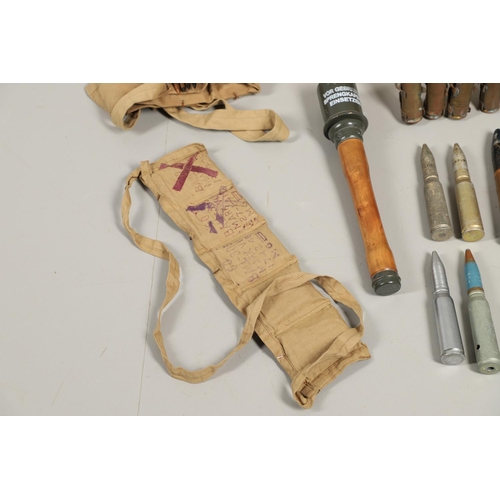 505 - A COLLECTION OF SHELL CASES, DUMMY ROUNDS AND A REPRODUCTION GRENADE. A 1947 3-IN-50 CAL Mk 7 shell ... 