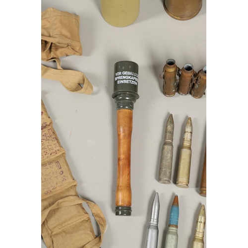 505 - A COLLECTION OF SHELL CASES, DUMMY ROUNDS AND A REPRODUCTION GRENADE. A 1947 3-IN-50 CAL Mk 7 shell ... 