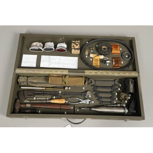 512 - A TOOL KIT FOR A 1942 FORD JEEP AND OTHER RELATED ITEMS. An extensive tool kit for a 1942 Ford Jeep ... 