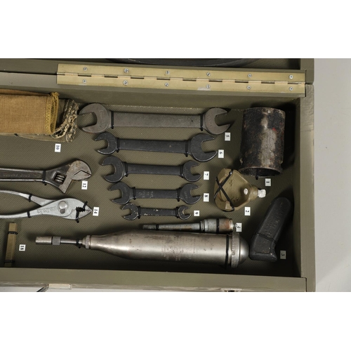 512 - A TOOL KIT FOR A 1942 FORD JEEP AND OTHER RELATED ITEMS. An extensive tool kit for a 1942 Ford Jeep ... 