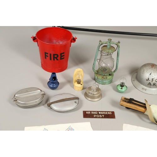 513 - A COLLECTION OF SECOND WORLD WAR HOME FRONT ITEMS TO INCLUDE A.R.P. EQUIPMENT. A collection of Secon... 