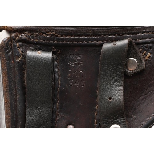 518 - A SECOND WORLD WAR GERMAN LUGER HOLSTER DATED 1940. A black leather Luger holster with side fitted m... 