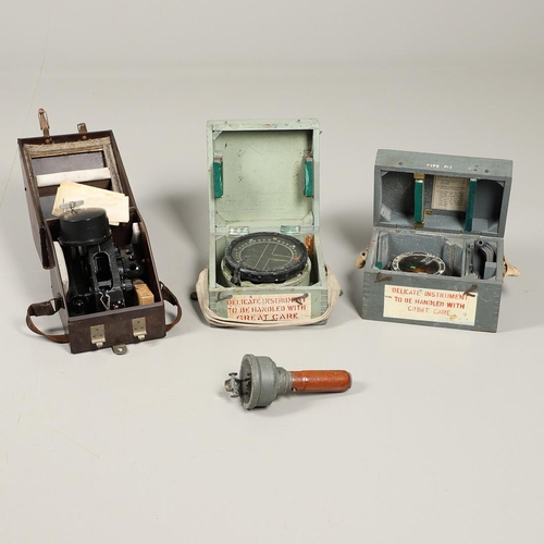 521 - AN AIR MINISTRY BUBBLE SEXTANT AND THREE COMPASSES. An Air Ministry Mk Bubble Sextant IXA 6B/218 No.... 