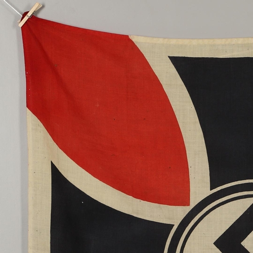 525 - A THIRD REICH WAR VETERANS BANNER OR FLAG. A square printed cotton flag or banner with a swastika ag... 