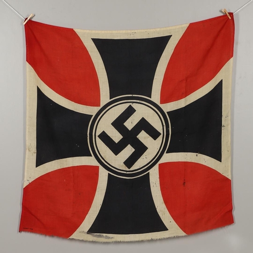 525 - A THIRD REICH WAR VETERANS BANNER OR FLAG. A square printed cotton flag or banner with a swastika ag... 