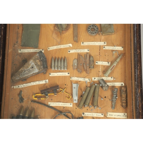 527 - A COLLECTORS CABINET CONTAINING A VARIED AND INTERESTING COLLECTION OF SECOND WORLD WAR ARTEFACTS. A... 