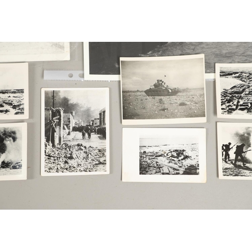 529 - AN INTERESTING COLLECTION OF SECOND WORLD WAR PHOTOGRAPHS TO INCLUDE IMAGES OF TANKS LANDING AT NORM... 