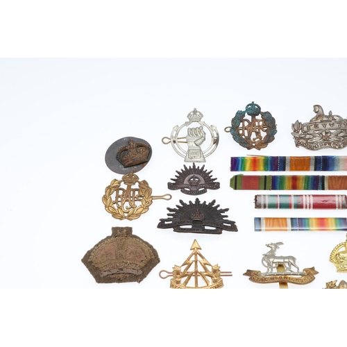 534 - AN INTERESTING COLLECTION OF SECOND WORLD WAR AND OTHER CAP BADGES AND INSIGNIA. A collection of bad... 