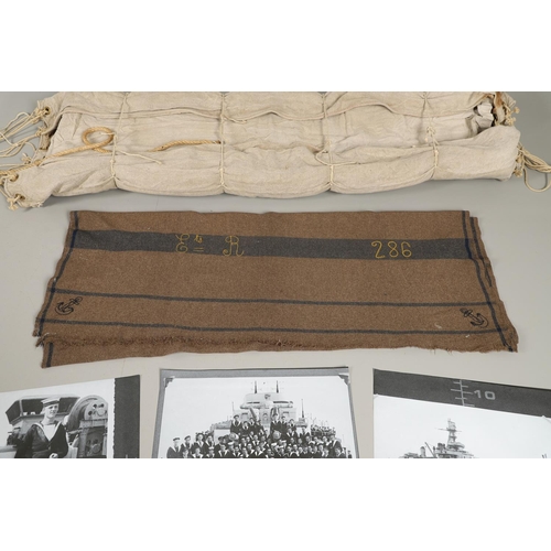 538 - A SECOND WORLD WAR OR LATER SHIP's  HAMMOCK, BLANKET AND A COLLECTION OF PHOTOGRAPHS. A ship's  hamm... 