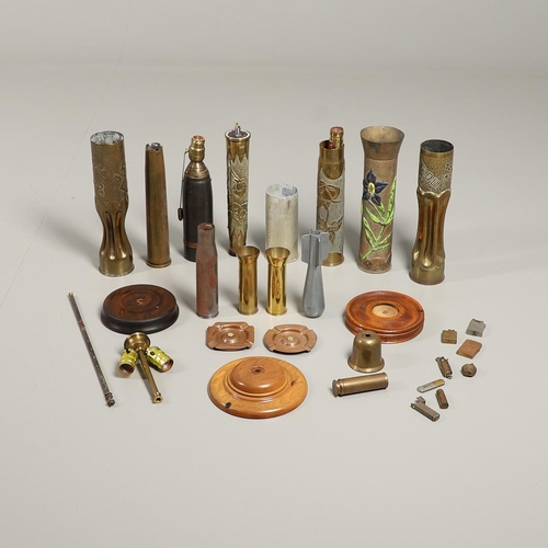 539 - A COLLECTION OF TRENCH ART SHELLS AND LIGHTERS. A collection of trench art to include two similar sh... 