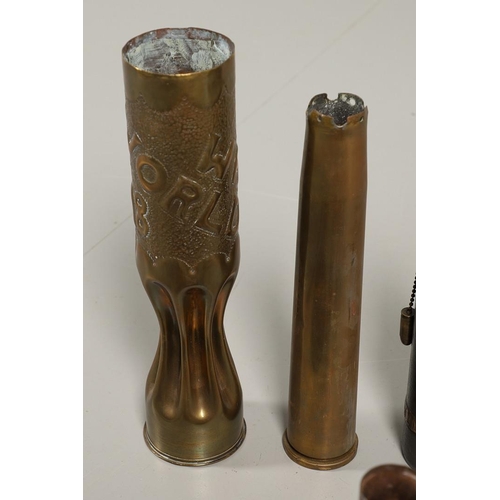 539 - A COLLECTION OF TRENCH ART SHELLS AND LIGHTERS. A collection of trench art to include two similar sh... 