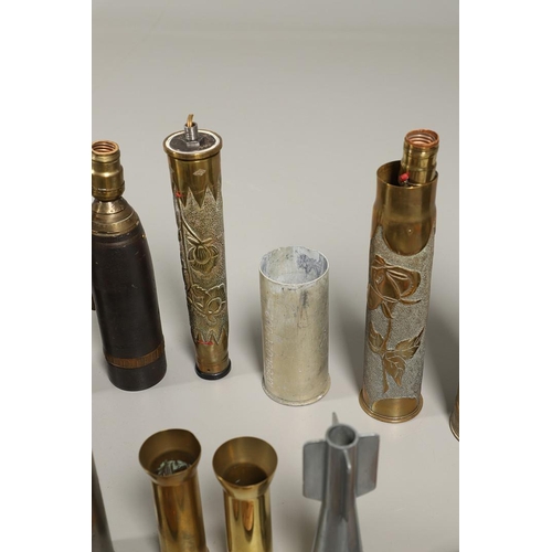 539 - A COLLECTION OF TRENCH ART SHELLS AND LIGHTERS. A collection of trench art to include two similar sh... 