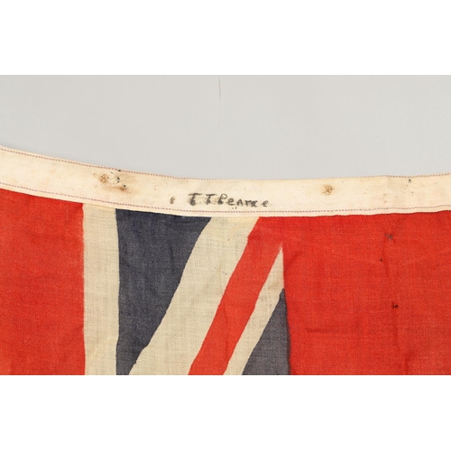 543 - A COLLECTION OF BRITISH FLAGS: TWO UNION JACKS, A RED AND WHITE ENSIGN. A Union Jack of sewn constru... 