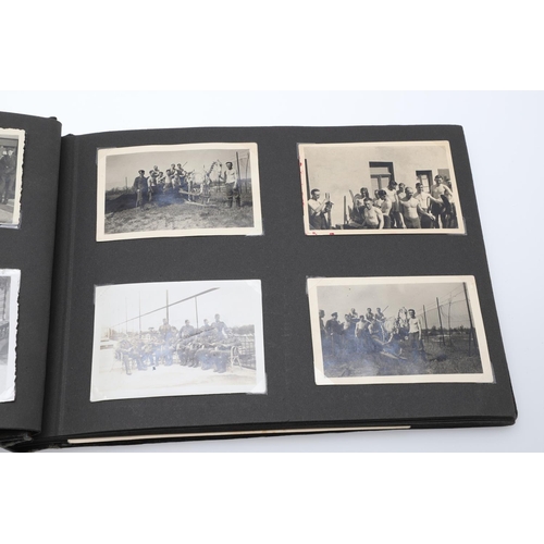 546 - A SECOND WORLD WAR GERMAN 'MEMORIES OF THE WAR' ALBUM AND PHOTOGRAPHS. A photograph album with leath... 