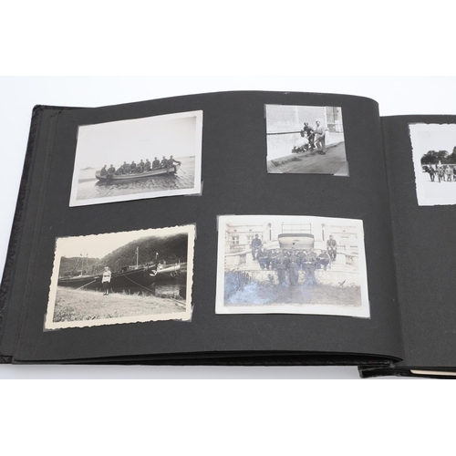 546 - A SECOND WORLD WAR GERMAN 'MEMORIES OF THE WAR' ALBUM AND PHOTOGRAPHS. A photograph album with leath... 