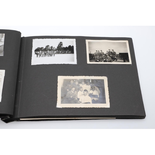 546 - A SECOND WORLD WAR GERMAN 'MEMORIES OF THE WAR' ALBUM AND PHOTOGRAPHS. A photograph album with leath... 