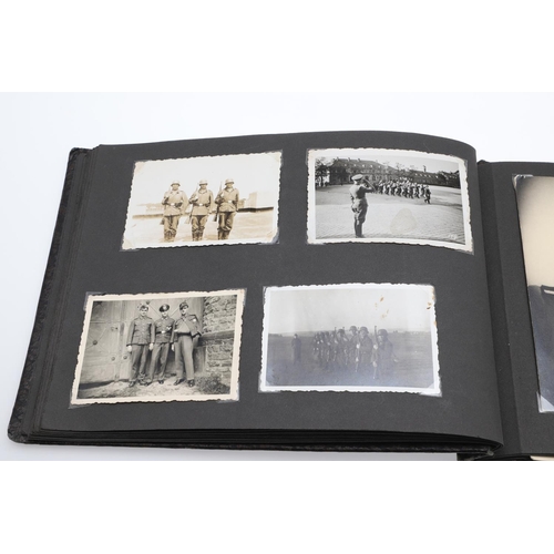 546 - A SECOND WORLD WAR GERMAN 'MEMORIES OF THE WAR' ALBUM AND PHOTOGRAPHS. A photograph album with leath... 