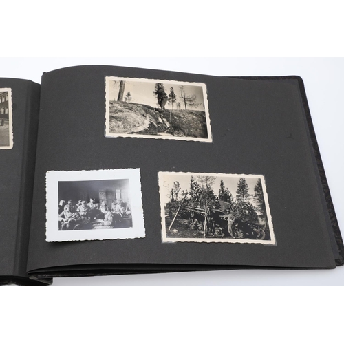 546 - A SECOND WORLD WAR GERMAN 'MEMORIES OF THE WAR' ALBUM AND PHOTOGRAPHS. A photograph album with leath... 