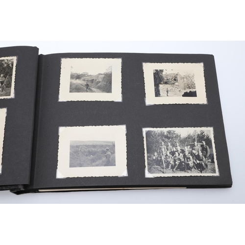 546 - A SECOND WORLD WAR GERMAN 'MEMORIES OF THE WAR' ALBUM AND PHOTOGRAPHS. A photograph album with leath... 