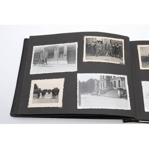 546 - A SECOND WORLD WAR GERMAN 'MEMORIES OF THE WAR' ALBUM AND PHOTOGRAPHS. A photograph album with leath... 