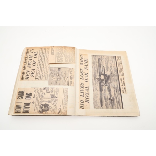 550 - AN INTERESTING SECOND WORLD WAR SCRAP BOOK. A scrap book containing a wide ranging collection of new... 