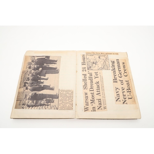 550 - AN INTERESTING SECOND WORLD WAR SCRAP BOOK. A scrap book containing a wide ranging collection of new... 