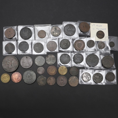 559 - A COLLECTION OF REGIONAL ISSUES AND TOKENS, 18TH CENTURY AND LATER. A mixed collection of trade toke... 