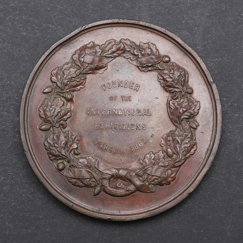 569 - A VICTORIAN BRONZE MEDAL COMMEMORATING THE LIFE OF PRINCE ALBERT. Profile portrait of Prince Albert ... 