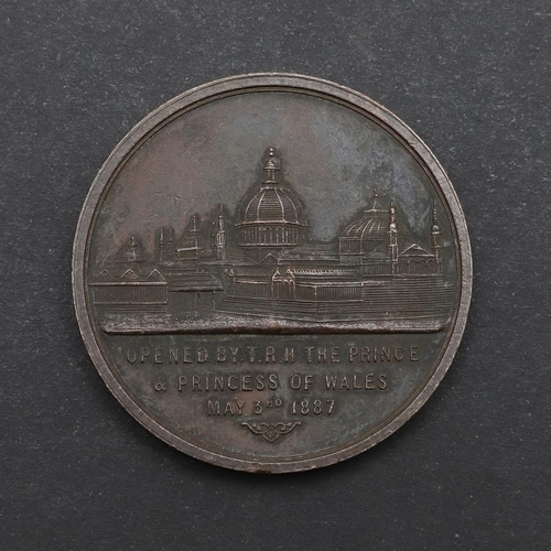 570 - A VICTORIAN BRONZE MEDAL FOR THE JUBILLEE EXHIBITION IN MANCHESTER 1887. Royal Jubilee Exhibition, M... 