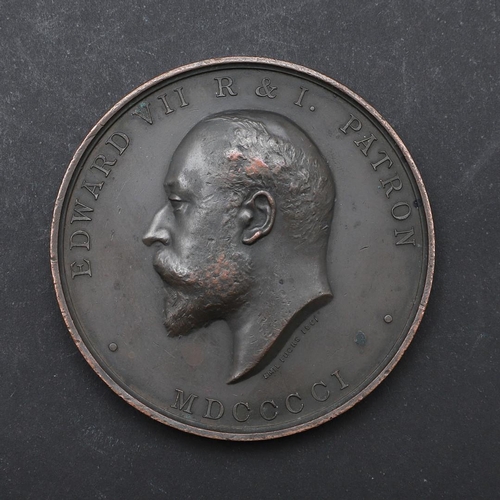 572 - AN EDWARD VII SOCIETY OF ARTS AWARD MEDAL AND TWO OTHERS. A Bronze medal, obverse Edward VII bust r ... 