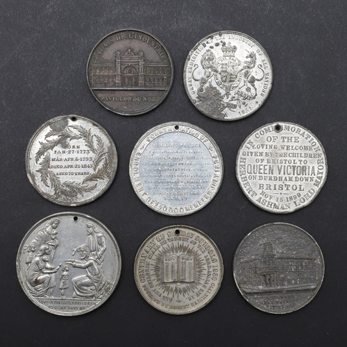 573 - A COLLECTION OF VICTORIAN WHITE METAL MEDALS. A collection of white metal souvenir and commemorative... 