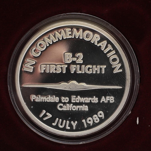 582 - A COLLECTION OF FOUR SILVER AVIATION RELATED COMMEMORATIVE MEDALS. A fine silver one troy ounce meda... 