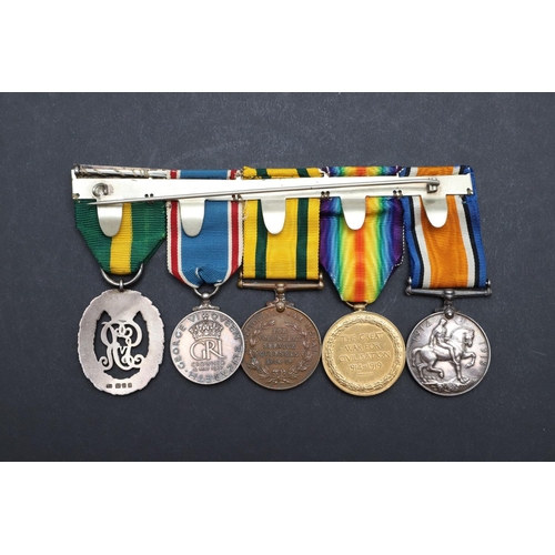 607 - A FIRST WORLD WAR TERRITORIAL MEDAL GROUP OF FIVE TO AN OFFICER IN THE 1/7 HAMPSHIRE REGIMENT. A Gre... 