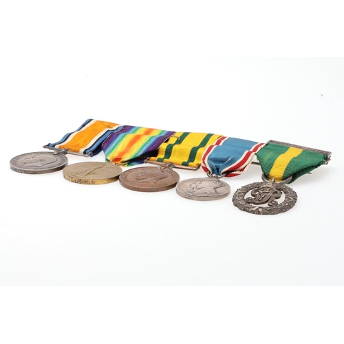 607 - A FIRST WORLD WAR TERRITORIAL MEDAL GROUP OF FIVE TO AN OFFICER IN THE 1/7 HAMPSHIRE REGIMENT. A Gre... 