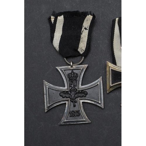 610 - A FIRST WORLD GERMAN GROUP OF THREE AND ANOTHER. A group of three comprising Iron Cross 2nd class, f... 