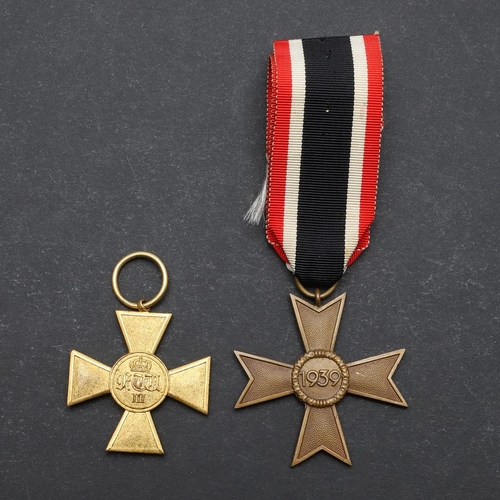 611 - A FIRST WORLD WAR PRUSSIAN LONG SERVICE CROSS AND A LATER WAR MERIT CROSS. An Imperial German Prussi... 