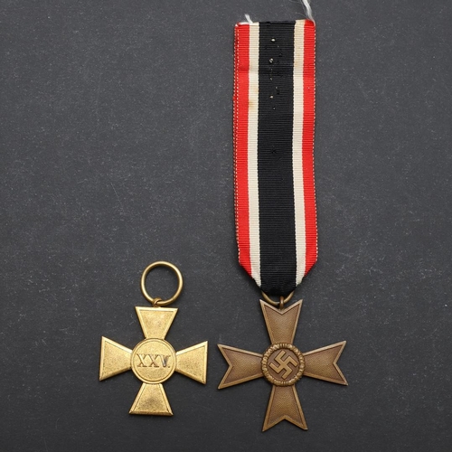 611 - A FIRST WORLD WAR PRUSSIAN LONG SERVICE CROSS AND A LATER WAR MERIT CROSS. An Imperial German Prussi... 