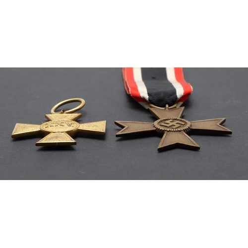 611 - A FIRST WORLD WAR PRUSSIAN LONG SERVICE CROSS AND A LATER WAR MERIT CROSS. An Imperial German Prussi... 