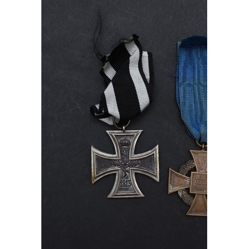 612 - A FIRST WORLD WAR GERMAN IRON CROSS, A SIMILAR SECOND WORLD WAR EXAMPLE AND A CIVILIAN LONG SERVICE ... 