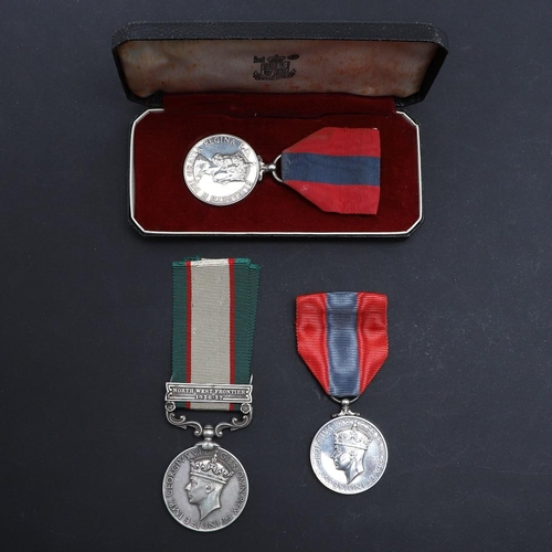 615 - AN INDIA GENERAL SERVICE MEDAL AND TWO IMPERIAL SERVICE MEDALS. An India General Service Medal 1936-... 