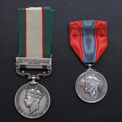 615 - AN INDIA GENERAL SERVICE MEDAL AND TWO IMPERIAL SERVICE MEDALS. An India General Service Medal 1936-... 