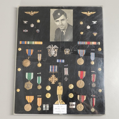 624 - A FINE SET OF AMERICAN SECOND WORLD WAR MEDALS AND INSIGNIA AWARDED TO COMMANDER CROWLEY OF THE U.S.... 