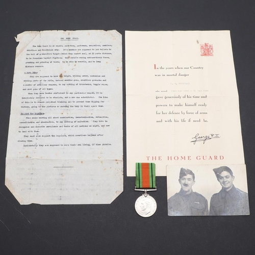 625 - A SECOND WORLD WAR DEFENCE MEDAL AND LAPEL BADGE TO THE HOME GUARD. A Second World War Defence Medal... 